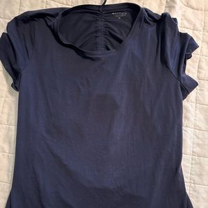 Athleta peekaboo open back short sleeve blue t shirt.